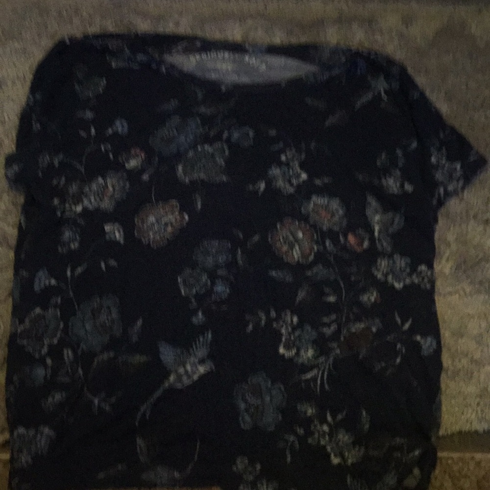 blue shirt with flowers